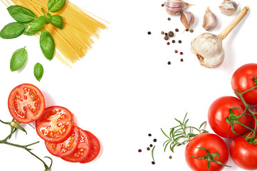 Spaghetti with tomatoes garlic and basil isolated on white background. Top view.