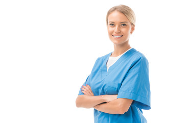 happy young nurse with crossed arms looking at camera isolated on white - obrazy, fototapety, plakaty