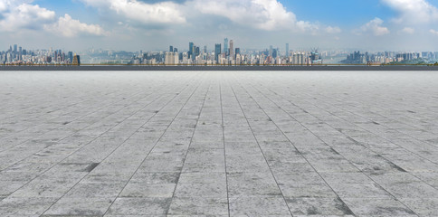 Urban skyscrapers with empty square floor tiles
