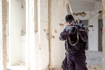 Sniper stand up inside building