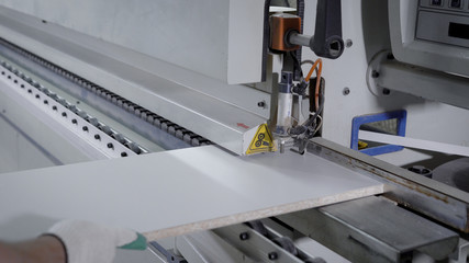 Big factory machine white standing and working in manufactory work room