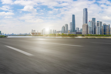 Obraz premium Road pavement and Guangzhou city buildings skyline