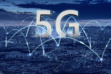 The concept of a virtual city skyline using the 5G network wireless system that becomes the fourth industrial revolution, the Internet of things, a smart city and a communication network.