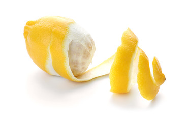 Naklejka na ściany i meble Peeled ripe lemon on white background