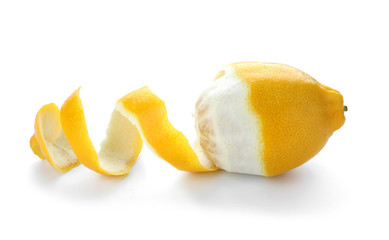 Peeled ripe lemon on white background