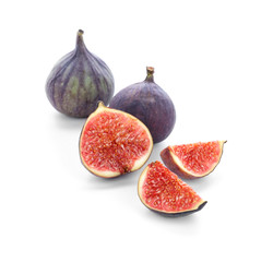 Fresh ripe figs on white background