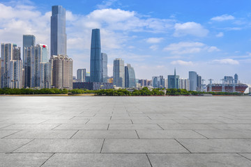 Urban skyscrapers with empty square floor tiles