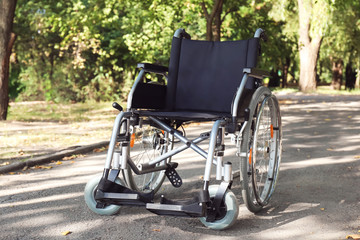 Empty modern wheelchair in park