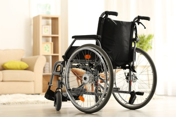 Empty modern wheelchair in living room