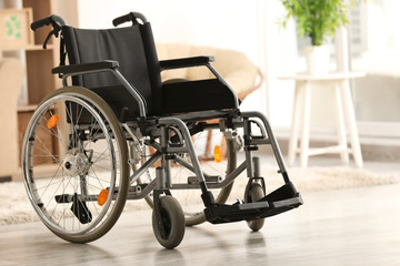Empty modern wheelchair in living room