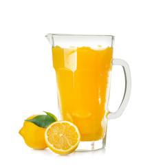 Jug of fresh lemon juice on white background