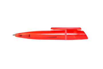 Little red plastic ballpoint pen isolated on white background