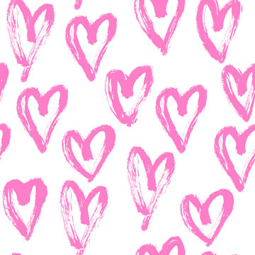 Seamless artistic abstract heart pattern. Hand drawn repeatable creative background. Paint stain grunge design from painted texture. Pink and white brush strokes drawing.