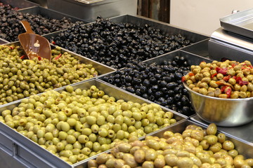 Market stall with a mix of fresh olives