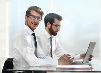 business colleagues work online sitting in the office