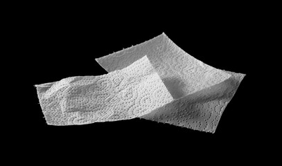 Toilet paper isolated on black background, clipping path