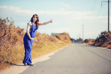 Pregnant woman hitchhiking the car