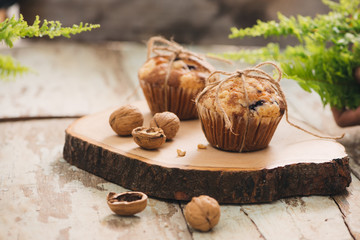 Dellicious homemade nut muffins on table. Sweet pastries