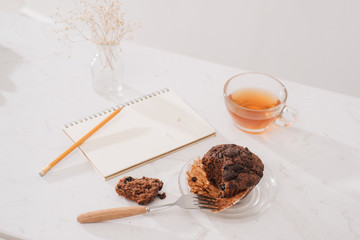 Breakfast with fresh homemade delicious muffins and tea.