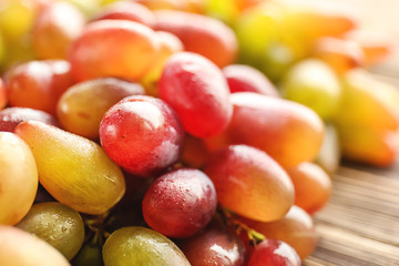 Ripe sweet grapes on table, closeup