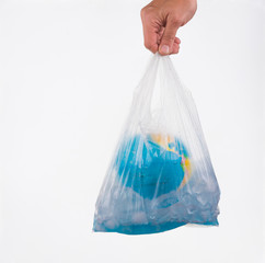 hand with globe in a bag ,World Environment Day.