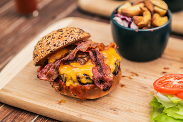 Delicious burger with bacon.