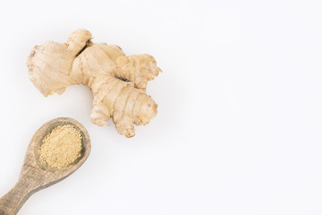 Fresh ginger root and ground ginger spice