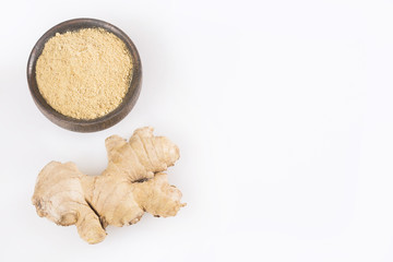 Fresh ginger root and ground ginger spice