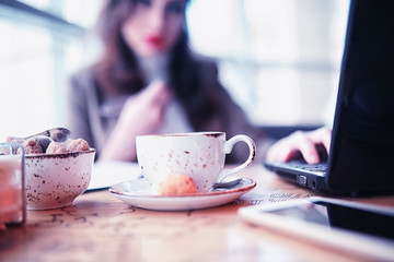 Girl eating coffee cakes