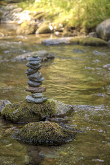 Fototapeta na wymiar Zen balancing pebbles from river stones stack. Tranquil Concept