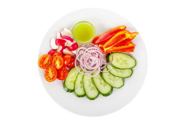Snack, aperitif assorted fresh vegetables, cherry tomatoes, cucumber slices, radish, pepper, onion, butter sauce, basil, before alcohol, food on plate white isolated background view from above