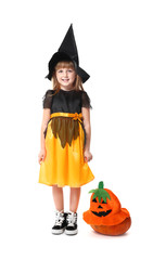 Cute little girl dressed as witch for Halloween on white background