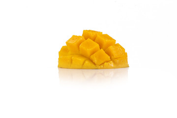 Mango cubes isolated on a white background