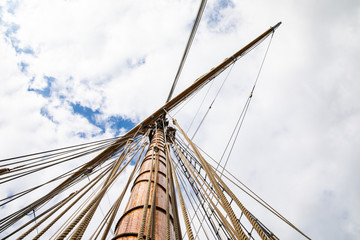 Looking up a mast and its rigging, a 3-masted schooner on its way under motor from Turku to the Island of Aspö in Archipelago National Park (Skärgårdshavet nationalpark), Finland.