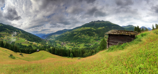 Beautiful panoramic view of the Val d’Anniviers valley in Switzerland with the villages...