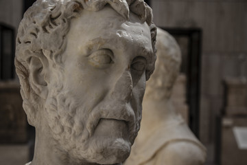 Sculpture of ancient marble head with broken nose