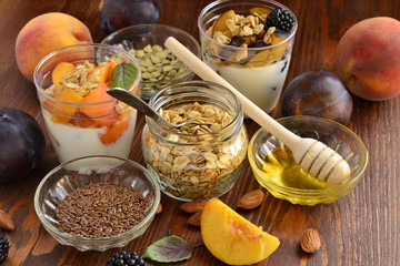 Healthy food - seeds, berries, yogurt, granola and fruit. Diet concept