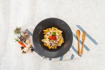 Radiatori pasta in a creamy tomato parmesan cheese sauce