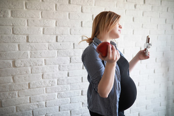 Pregnant young beautiful girl on the ninth month 