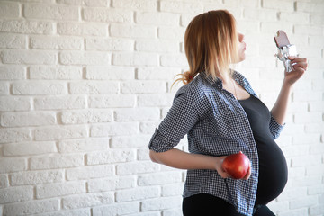 Pregnant young beautiful girl on the ninth month 