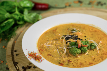 Soup with broccoli, rice noodles and vegetables