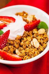 Strawberry Cinnamon Granola Yogurt Breakfast. Selective focus.