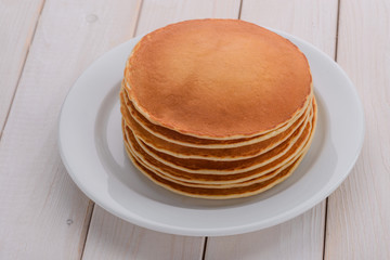 Dish full of tasty pancakes