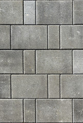 Fototapeta premium Concrete or cobble gray pavement slabs or stones for floor, wall or path.