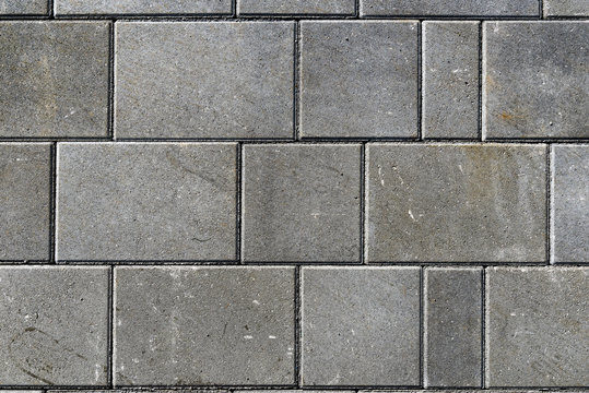 Concrete or cobble gray pavement slabs or stones  for floor, wall or path.