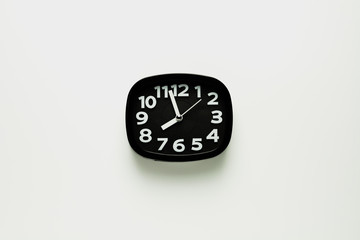 black clock isolated on white background.