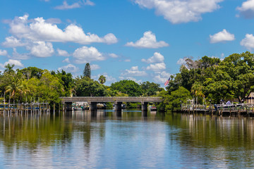 Fototapeta na wymiar Peaceful canal with a bridge