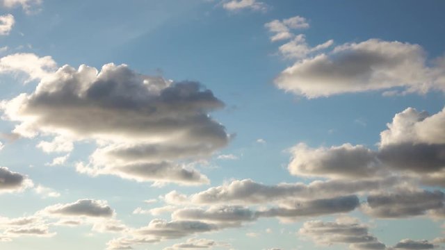 4k Timelapse of Sun clouds with blue sky in background