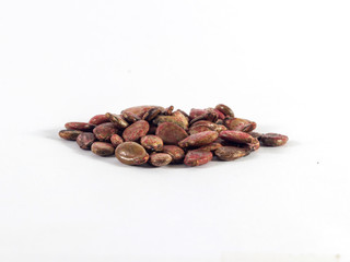 Pile of dried watermelon seeds on white background