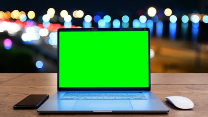Computer laptop with green screen. - Powered by Adobe